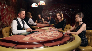 dealer-shuffles-the-young-women-in-the-casino_rfsdxsif_thumbnail-full01